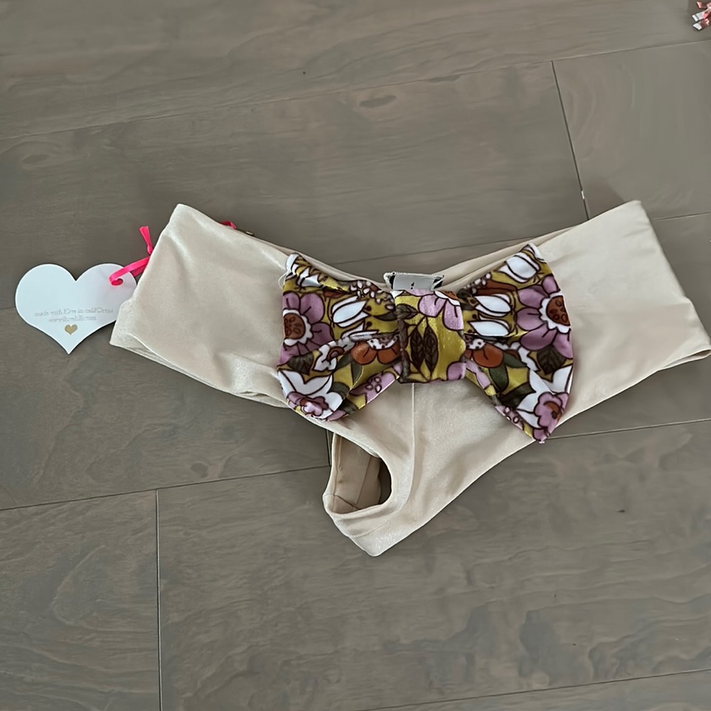 BNWT lolli swim bikini bottoms with bow detail size Small